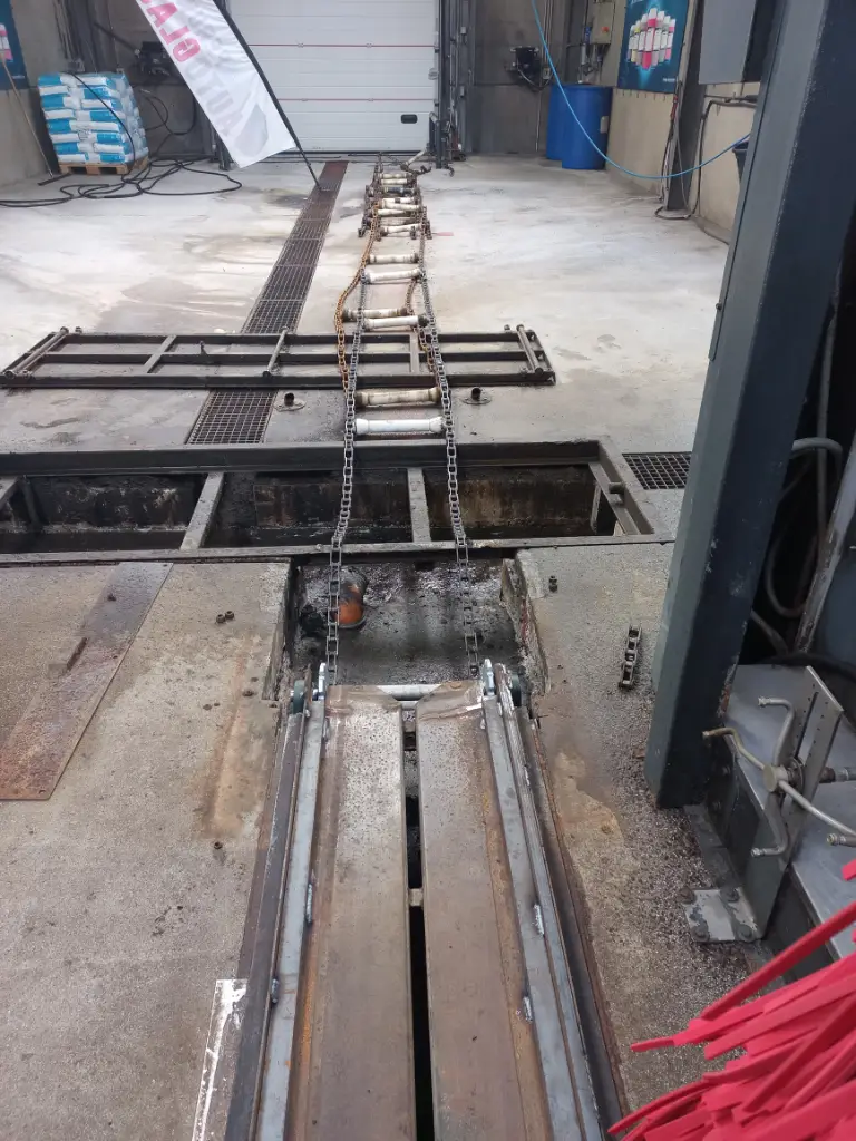 Remplacement des chaînes d'une station de lavage